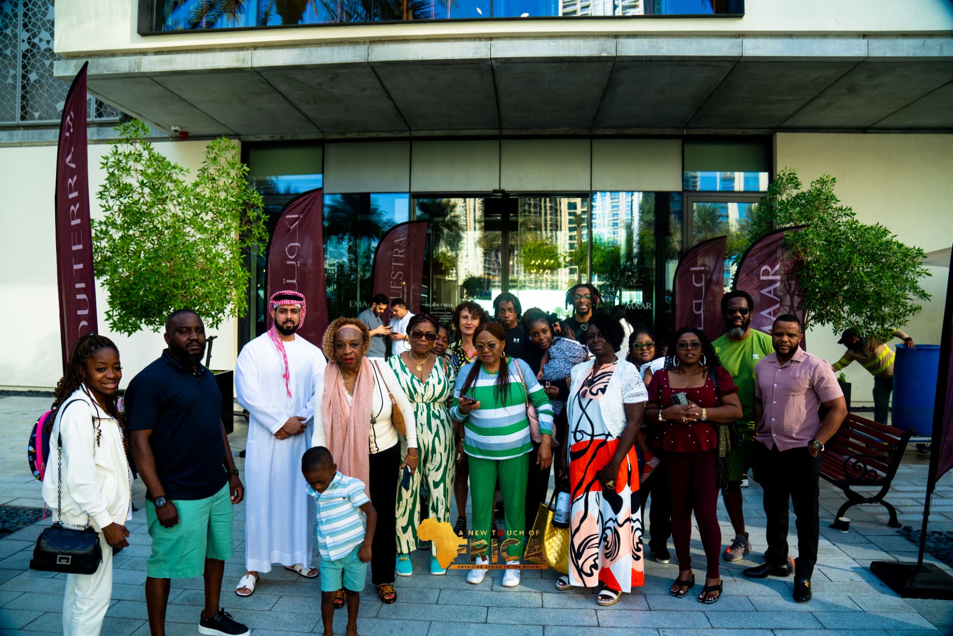 Full group portrait of ANTOA travellers at the Dubai Creek Harbour Sales Pavilion