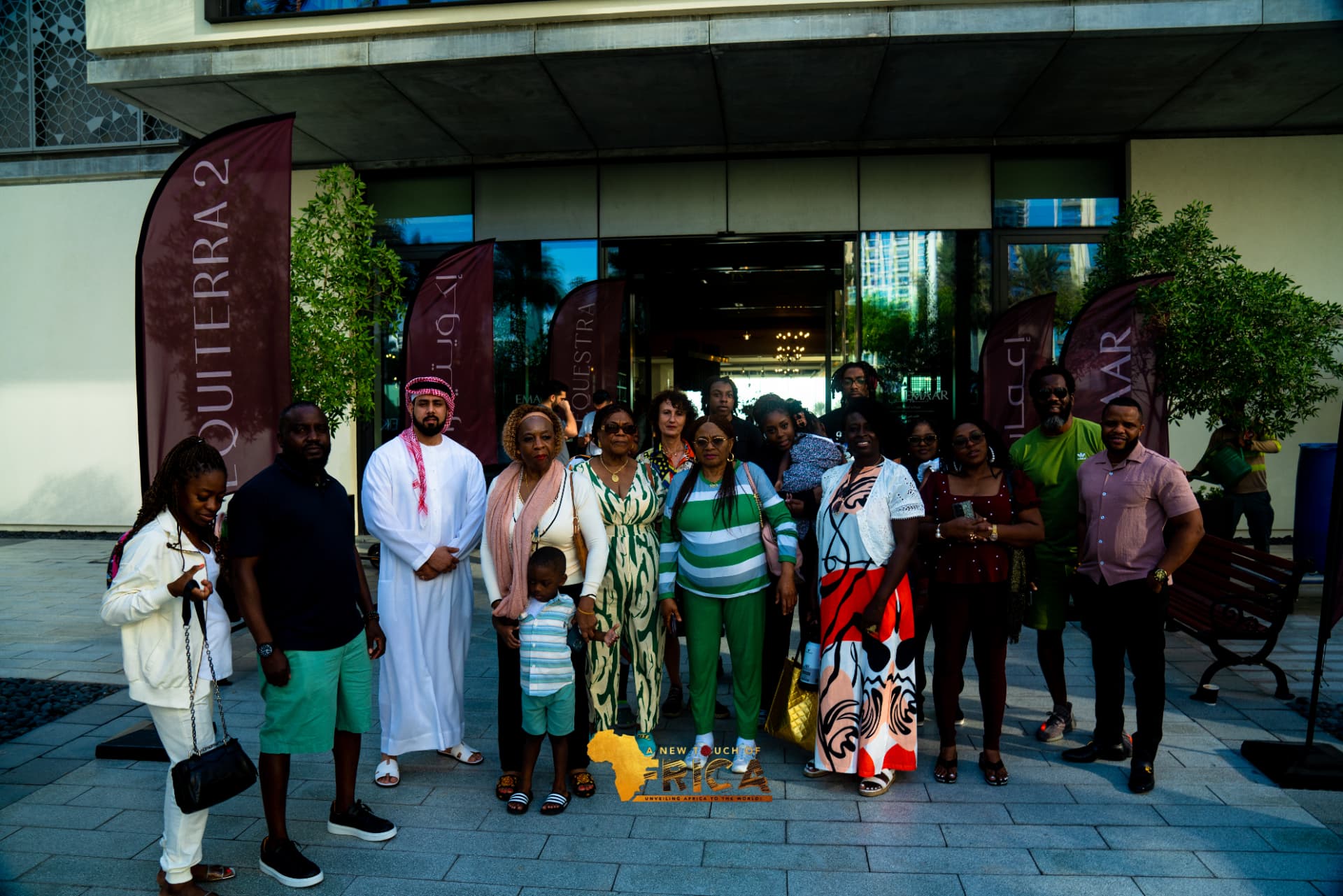 ANTOA guests and their host gathered outside the Emaar sales pavilion