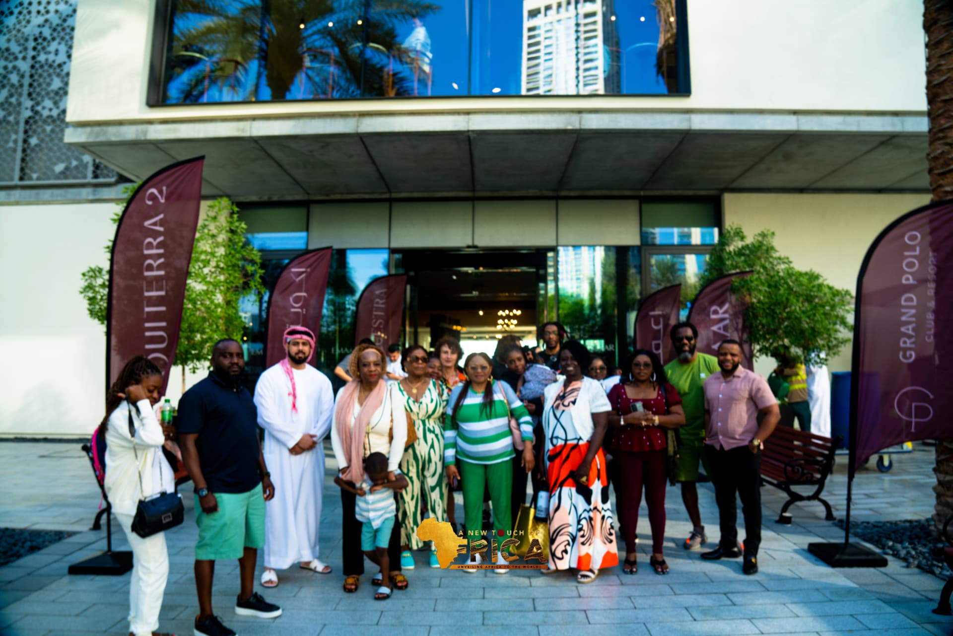 Group portrait of ANTOA travellers with their Emirati host in Dubai